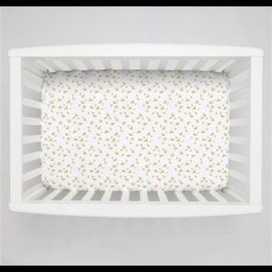 white and gold crib sheet